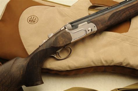 You can hear the sound of cheep Beretta dt11L vs the solid Perazzi mx2000s. . Beretta dt11 vs perazzi